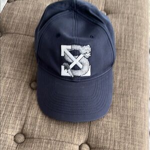 Off-white hat in navy and white - like new - adjustable